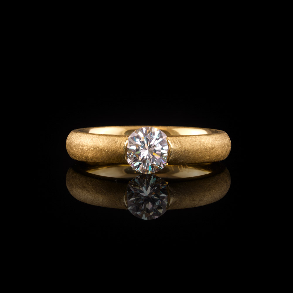 Pseudospannring mit Brilliant / 750er Gelbgold - 11.160 €